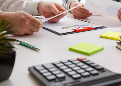 Editor marking up a printed document